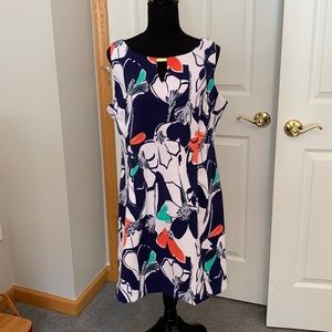 Sleeveless dress, back zip. Navy and white with green and coral